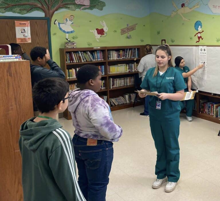 KHS Students in the CTE Health Sciences Program Help Elementary Students with Screenings