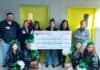 KISD Educators receive over $21,000 in grants Cheerleaders, KEF, and teacher pose with large check